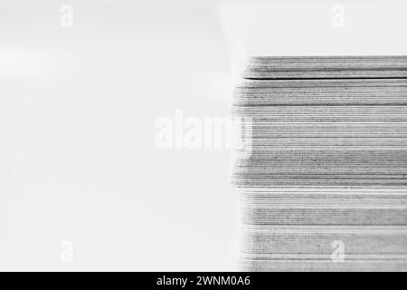 Close sidelong view of stacked cards in monochrome Stock Photo