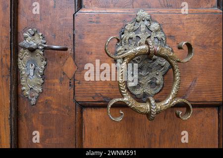 Historic door handle and door knocker from the 16th century, Bavaria, Germany Stock Photo