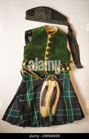 A Four year's olds vintage clan outfit, about 1910, showing waistcoat kilt and glengarry bonnet. Stock Photo