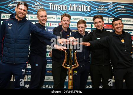 (L-R) Filippo Ganna of Italy and Team INEOS Grenadiers, Tim Merlier of Belgium and Soudal Quick-Step, Tao Geoghegan Hart of Great Britain and Lidl-Trek, Jonas Vingegaard Hansen of Denmark and Visma-Lease a Bike, Jai Hindley of Australia and Team Bora &#x2013; Hansgrohe and Richard Antonio Carapaz Montenegro of Ecuador and EF Education-EasyPost pose for a photograph with the Trident race trophy during the 59th Tirreno-Adriatico 2024, Top Riders Press Conference in Lido di Camaiore, Tuscany, Italy. Sunday, MARCH 3, 2024. Sport - cycling. (Photo by Fabio Ferrari/LaPresse) Stock Photo