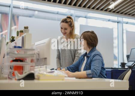 Professional female employees working in a printing house Stock Photo