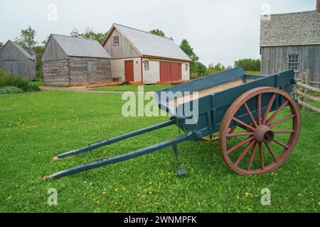 Antique horse drawn cart at Doucet House, North Rustico, Prince Edward Island, Canada Stock Photo