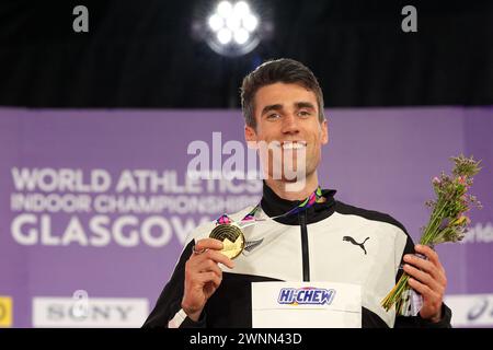 New Zealand's Hamish Kerr celebrates gold on the podium for the Men's High Jump during day three of the World Indoor Athletics Championships at the Emirates Arena, Glasgow. Picture date: Sunday March 3, 2024. Stock Photo