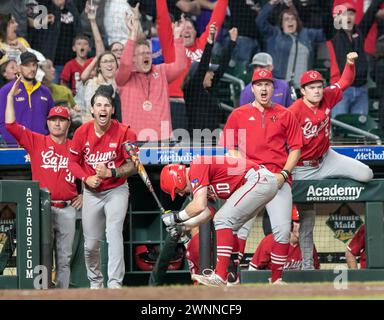 Houston, Texas, USA. 2nd Mar, 2024. Louisiana dugout react to a homerun during Saturday's game, apart of Astros Foundation College Classic, at Minute Maid Park, in Houston, Texas. (Credit Image: © Domenic Grey/ZUMA Press Wire) EDITORIAL USAGE ONLY! Not for Commercial USAGE! Stock Photo