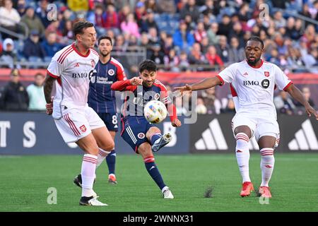 Foxborough Massachusetts, USA. 3rd Mar, 2024. Massachusetts, USA; New England Revolution midfielder Carles Gil (10) shoots the ball against the Toronto FC during the second half in Foxborough Massachusetts. Mandatory credit Eric Canha/CSM/Alamy Live News Stock Photo