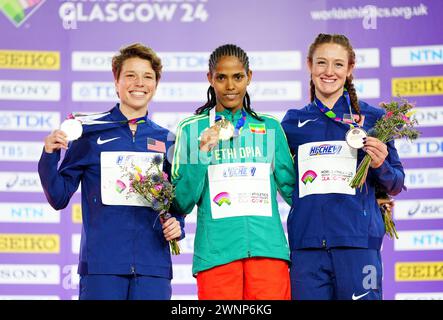 USA's Nikki Hiltz, silver, Ethiopia's Frewenyi Hailu, gold, USA's Emily MacKay, bronze, on the podium for the Women's 1500m during day three of the World Indoor Athletics Championships at the Emirates Arena, Glasgow. Picture date: Sunday March 3, 2024. Stock Photo