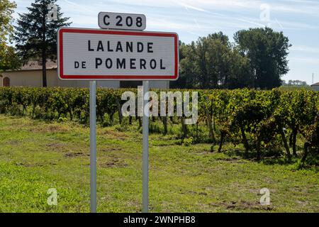 City road sign Lalande de Pomerol near Saint-Emilion wine making region, growing of Merlot or Cabernet Sauvignon red wine grapes, France, Bordeaux in Stock Photo