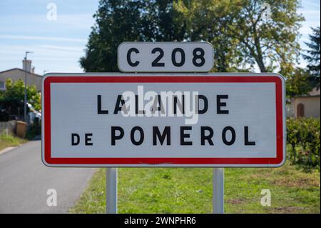 City road sign Lalande de Pomerol near Saint-Emilion wine making region, growing of Merlot or Cabernet Sauvignon red wine grapes, France, Bordeaux in Stock Photo