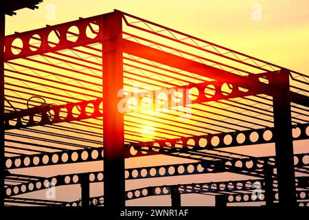 steel structure design geometric shape  abstract pattern warehouse building minimal style against nature background Stock Photo