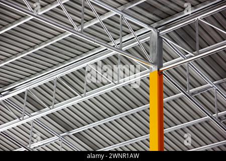 warehouse interior steel structure using geometric shape making abstract pattern for roof top and coy space Stock Photo
