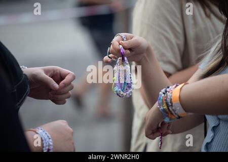 2 March 2024. At The Eras Tour concernt venue. Fans are exchanging Taylor Swift friendship bracelets among themselves. Singapore. Stock Photo