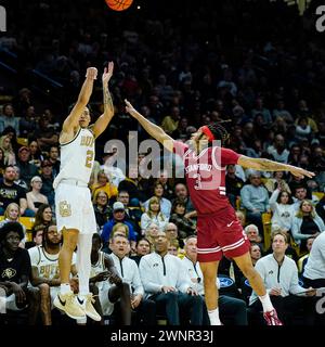 Boulder, CO, USA. 3rd Mar, 2024. Colorado Buffaloes guard KJ Simpson (2) shoots a three over Stanford Cardinal guard Kanaan Carlyle (3) in the second half of the men's basketball game between Colorado and Stanford at the Coors Events center in Boulder, CO. Derek Regensburger/CSM (Credit Image: © Derek Regensburger/Cal Sport Media). Credit: csm/Alamy Live News Stock Photo