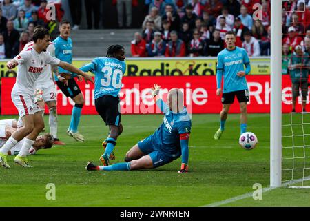 Cologne, Germany. 3rd Mar, 2024. Jeremie Frimpong (C) of Bayer 04 Leverkusen shoots to score during the first division of Bundesliga match between FC Cologne and Bayer 04 Leverkusen in Cologne, Germany, March 3, 2024. Credit: Joachim Bywaletz/Xinhua/Alamy Live News Stock Photo