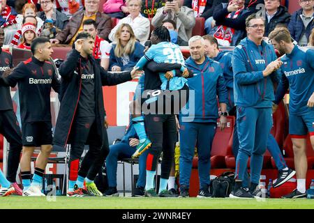 Cologne, Germany. 3rd Mar, 2024. Jeremie Frimpong (C) of Bayer 04 Leverkusen celebrates scoring during the first division of Bundesliga match between FC Cologne and Bayer 04 Leverkusen in Cologne, Germany, March 3, 2024. Credit: Joachim Bywaletz/Xinhua/Alamy Live News Stock Photo