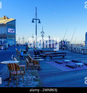 Tel-Aviv, Israel - February 29, 2024: View of the Jaffa port, with the moon. Now part of Tel-Aviv-Yafo, Israel Stock Photo