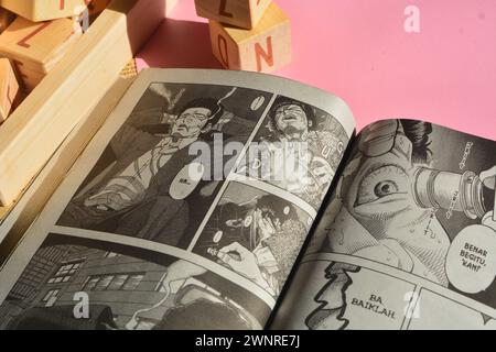 August 31, 2023, Close-up of an open comic book with bokeh background. Wadaslintang, Wonosobo Stock Photo