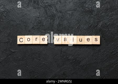 CORE VALUES word written on wood block. CORE VALUES text on cement table for your desing, concept. Stock Photo