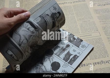August 31, 2023, Close-up of an open comic book with bokeh background. Wadaslintang, Wonosobo Stock Photo
