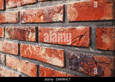 Old vintage brick wall texture in perspective texture as background, selective focus Stock Photo