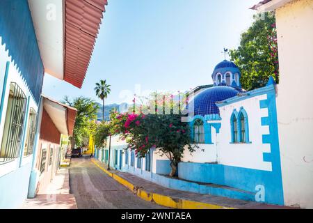 Amazing colorful buildings in pueblo magico Batopilas in Barrancas del Cobre mountains, Mexico Stock Photo