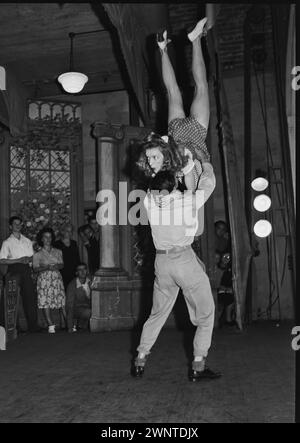 Sydney, Australia. February 1948 competion for Jitterbugs at Trocadero.  Male dancer throwing female partner in the air. Stock Photo