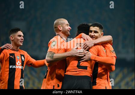 LVIV, UKRAINE - MARCH 3, 2024 - Players of FC Shakhtar Donetsk react to scoring during the 2023/2024 Ukrainian Premier League Matchday 19 game against FC Kryvbas Kryvyi Rih at the Arena Lviv, Lviv, western Ukraine. Stock Photo