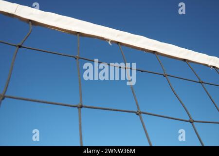Volleyball sports dividing net against the blue sky close-up. Outdoor sports Stock Photo