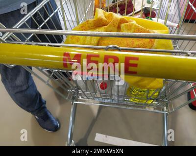 Shopping cart, MERE discounter chain stores, Ruma, Serbia, April 15, 2022 supermarket with logo and brand MERE. Food and household goods at cheap Stock Photo