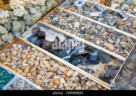 Natural gemstones on the showcase of a shop in bazaaar. Stock Photo