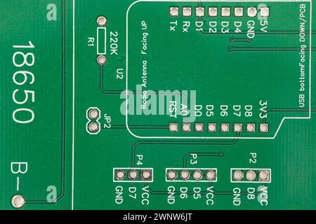 Close up of green computer accessory board to equip with electronic components. Stock Photo