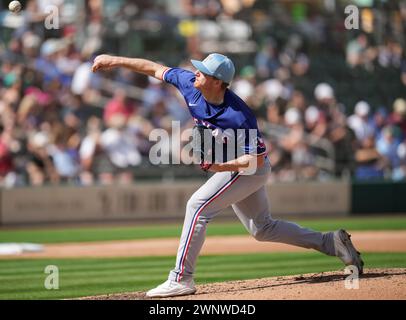 Texas Rangers relief pitcher Josh Sborz (66) pitches during MLB spring training Baseball game, Sunday, Mar. 3, 2024, in Mesa, Ariz. Oakland A beat Texas 5-2 (David Venezia/Image of Sport) Stock Photo