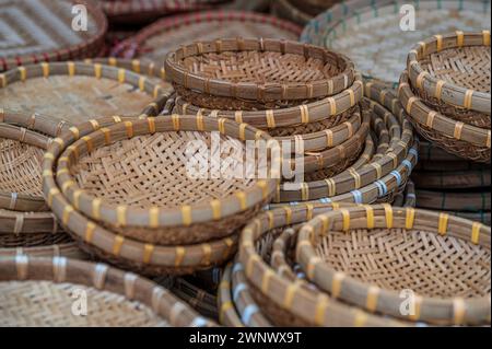 Close up view of multiple, traditional wicker baskets, for sale in a Vietnamese market Stock Photo