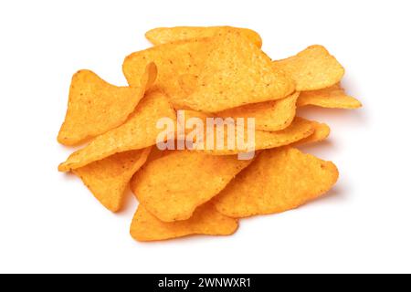 Heap of Tortilla Nacho Cheese Chips close up isolated on white background Stock Photo