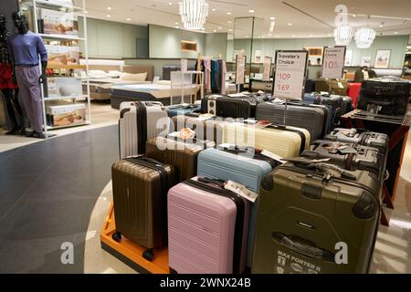 SINGAPORE - NOVEMBER 06, 2023: various suitcases displayed at Tang Plaza in Singapore. Stock Photo