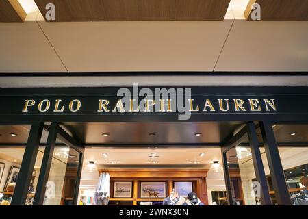 SINGAPORE - NOVEMBER 06, 2023: Polo Ralph Lauren sign over store entrance in the Paragon. Ralph Lauren Corporation is an American publicly traded fash Stock Photo