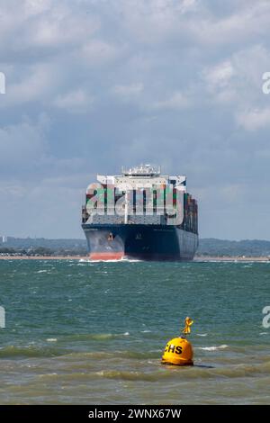 large container ship navigating the thorn shipping channel in the solent on the south coast of the uk after leaving the port of southampton docks uk Stock Photo