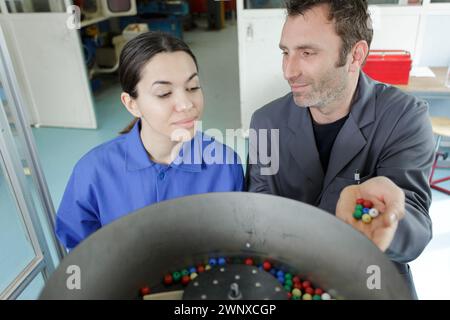 students in technical vocational training with teacher Stock Photo