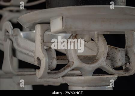 Detail of Old obsolete manual weighing scales on dark background. Close-up of Classic weight scale, Antique balance scales, Space for text, Selective Stock Photo