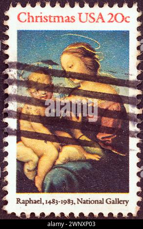 USA - CIRCA 1983: A stamp printed in USA from the 'Christmas' issue shows Madonna and Child by Raphael Stock Photo