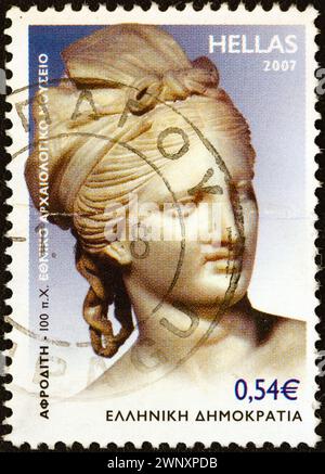 GREECE - CIRCA 2007: A stamp printed in Greece shows Aphrodite from the picturesque group of Aphrodite, Pan and Eros, Delos, around 100 B.C. Stock Photo