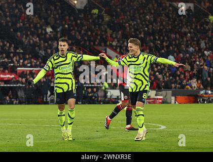 Bramall Lane, Sheffield, UK. 4th Mar, 2024. Premier League Football, Sheffield United versus Arsenal; Arsenal's Gabriel Martinelli celebrates with with team-mate Martin Odegaard after scoring his side's third goal in 15th minute to make the score 0-3 Credit: Action Plus Sports/Alamy Live News Stock Photo