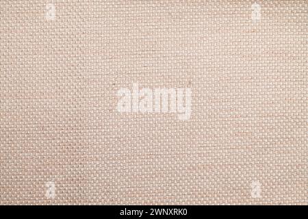Natural linen material textile canvas Fabric texture background Close-up detail of fabric natural color Hemp material pattern design wallpaper. Stock Photo