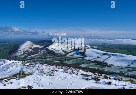 Snow on The Lawley, Hoar Edge, and Yell Bank, seen from a snowy Caer Caradoc, Church Stretton, Shropshire Stock Photo