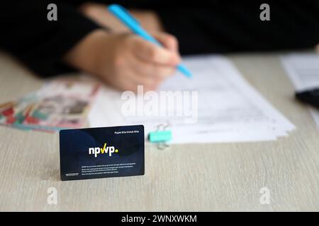 Indonesia NPWP new tax id Number card originally called Nomor Pokok Wajib Pajak. Used to carry out transactions related to taxation for Indonesian taxpayers. Stock Photo