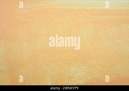 Orange oil painting on plastered wall. Oil paint texture with brush and palette knife strokes. Modern art concept. Horizontal fragment. Stock Photo