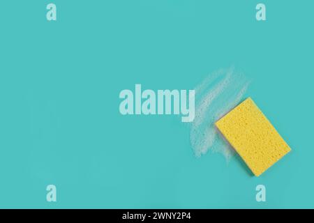 Washing Sponge lying on surface in soapy foam Stock Photo