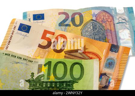 Close up on 100, 50 and 20 euro banknotes isolated on white in top view, three euro banknotes one over the next Stock Photo