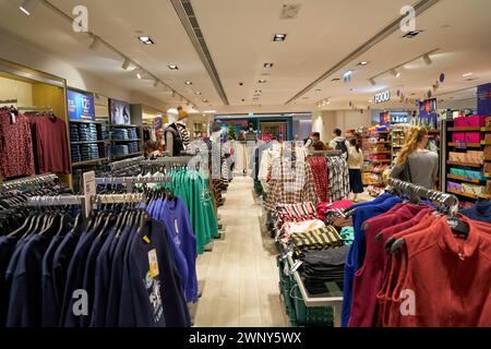 HONG KONG, CHINA - DECEMBER 04, 2023: apparel displayed at Marks and Spencer store in New Town Plaza shopping mall. Stock Photo