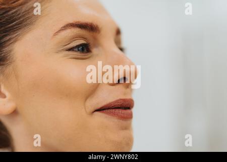 Profile photo of lovely woman with slight smile on her face. Copy space. Stock Photo
