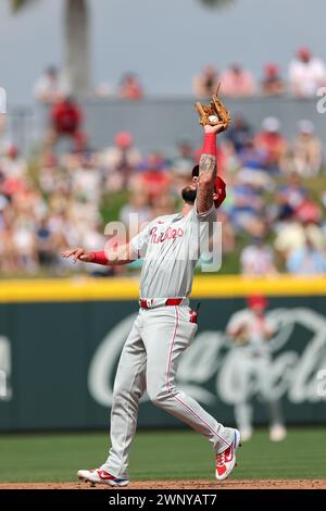 Philadelphia Phillies third baseman Michael Martinez (7) slams into the ...